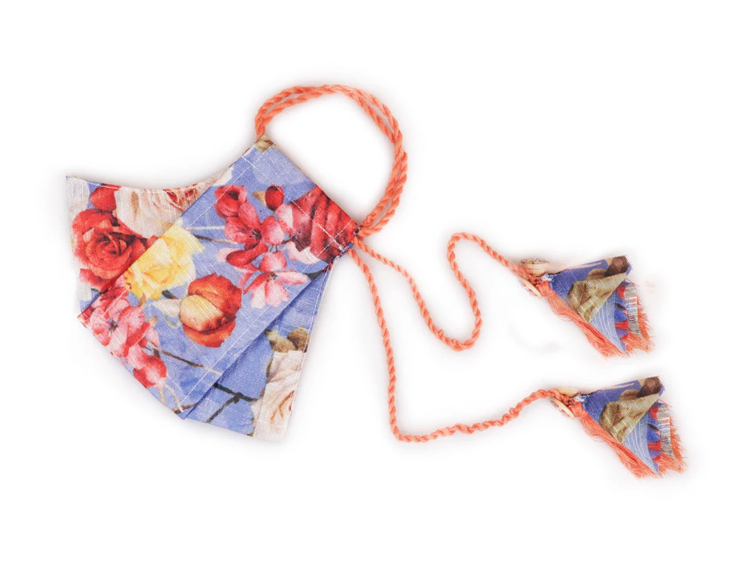 Vastramay Floral Printed Reusable Anti-Pollution, Cotton Dori Ear Loop And Choti Plus Tassels Style Wellness Mask In Blue With A Natural Fibre Potli Bag - Pack Of 1 Rakhi 7 Vastramay Floral Printed Reusable Anti-Pollution, Cotton Dori Ear Loop And Choti Plus Tassels Style Wellness Mask In Blue With A Natural Fibre Potli Bag - Pack Of 1 Rakhi