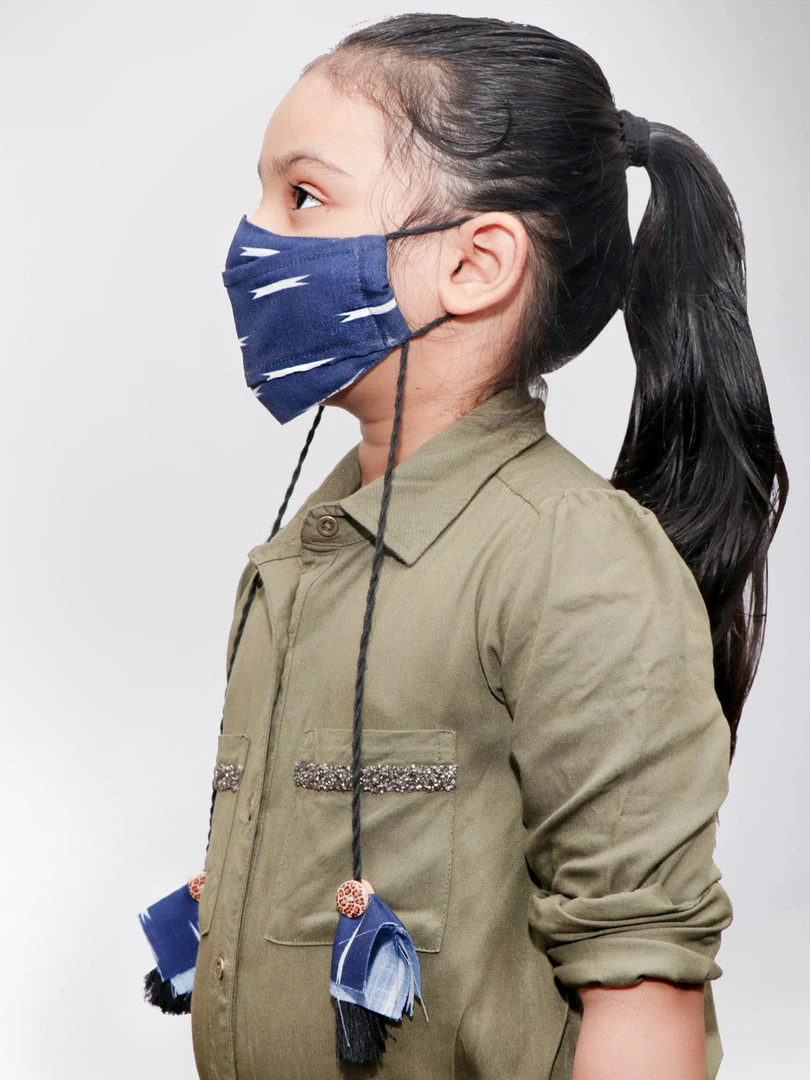 Vastramay Ikkat Printed Reusable Anti-Pollution, Cotton Dori Ear Loop And Choti Plus Tassels Style Wellness Mask In Blue With A Natural Fibre Potli Bag - Pack Of 1 9 Vastramay Ikkat Printed Reusable Anti-Pollution, Cotton Dori Ear Loop And Choti Plus Tassels Style Wellness Mask In Blue With A Natural Fibre Potli Bag - Pack Of 1